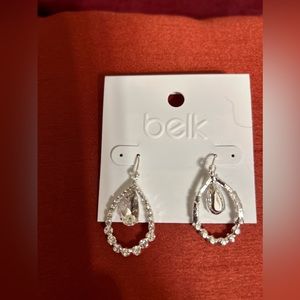 Silver tone teardrop earrings. Crystal white.